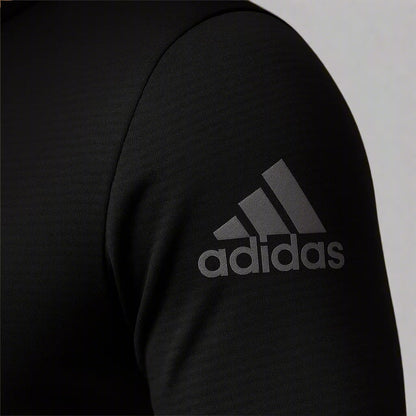 Black Adidas logo on a dark background