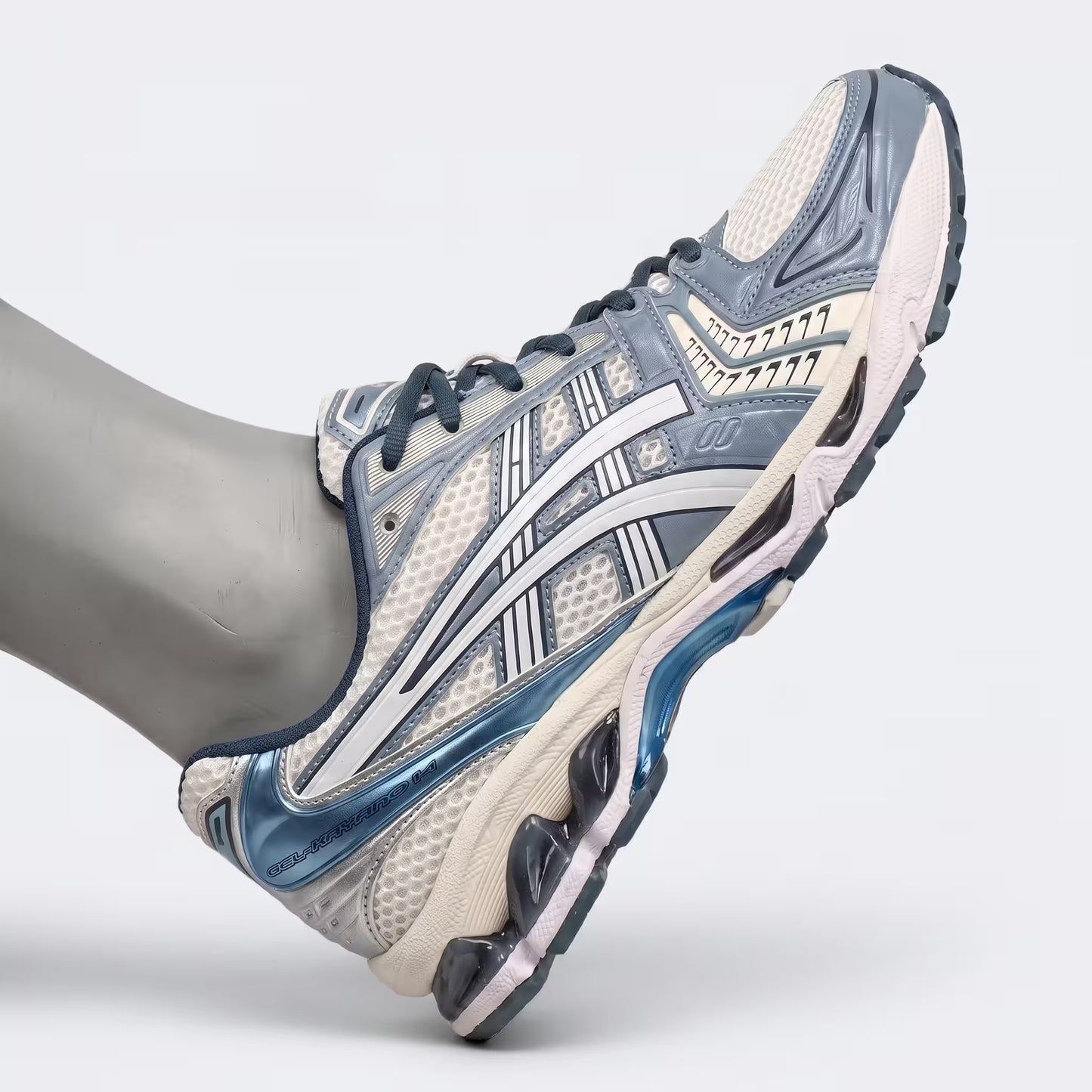 Verified ASICS Gel-Kayano 14 Cream/Raw Indigo 1203A537-116 structural scale check with TRUSSTIC support system visible.