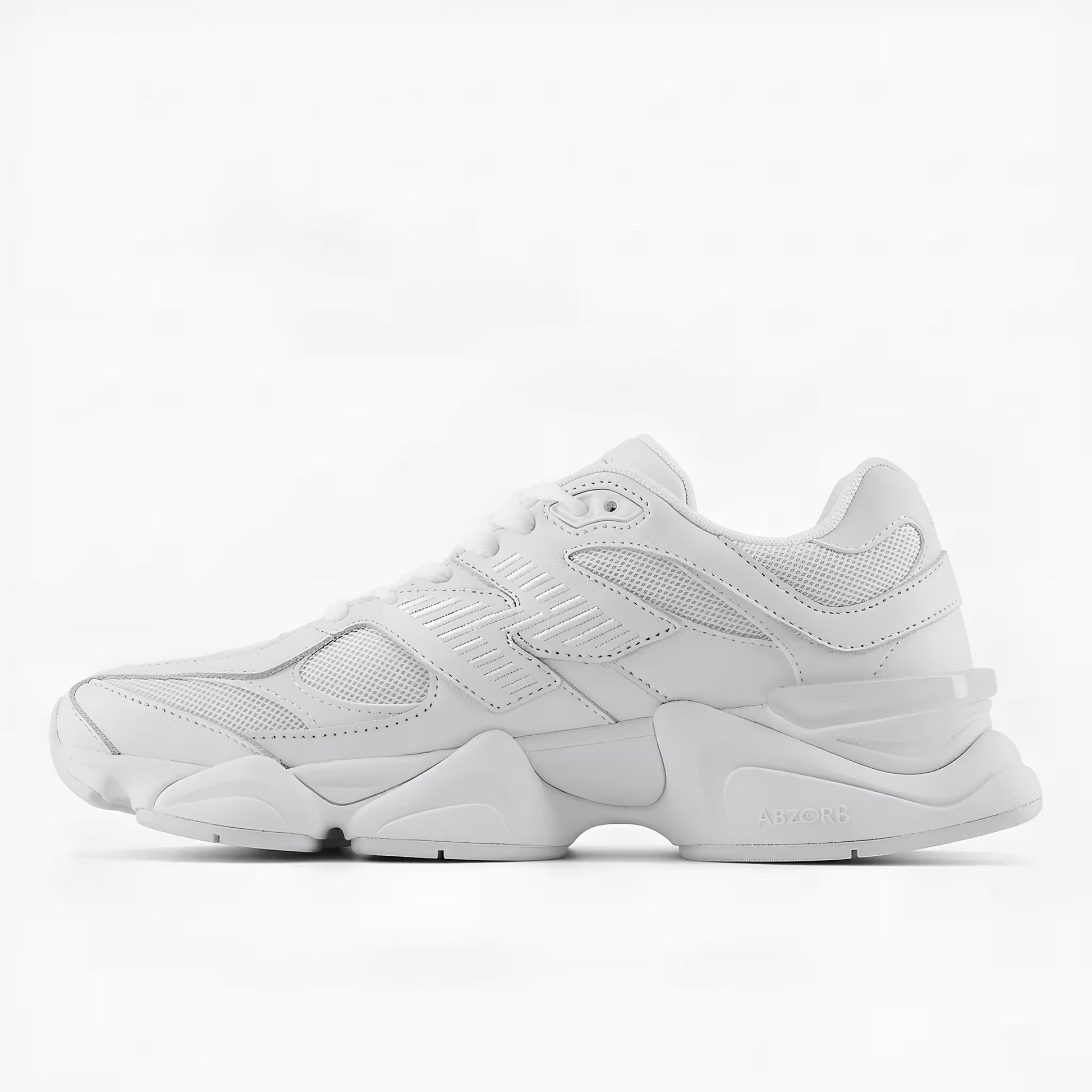 White new balance 9060 sneaker side profile on a white studio background