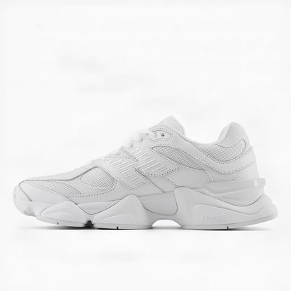 White new balance 9060 sneaker side profile on a white studio background
