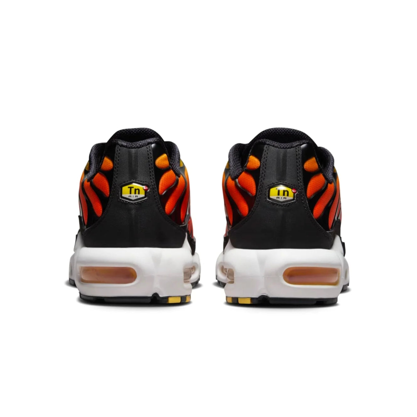 Black and orange TN sneakers with a visible brand logo on a white background
