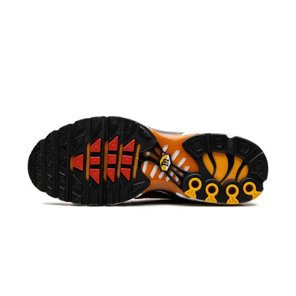 Close-up of a shoe sole with unique design elements on a white background