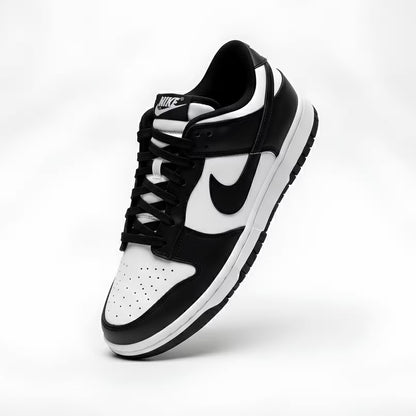 Black and white sneaker with Nike logo on a light gray background