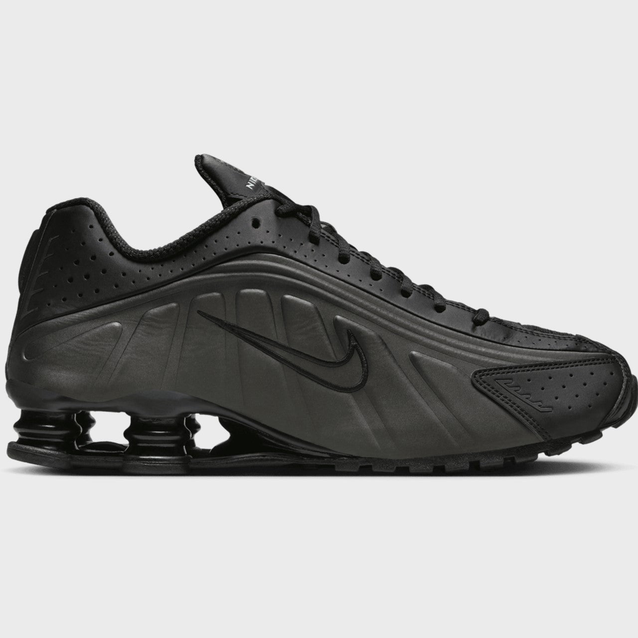 Black sneaker with Nike logo on a white background