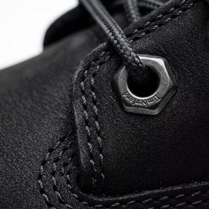 Timberland Premium 6-Inch Boot Black TB110073001 quadruple stitching and hardware verification close-up.