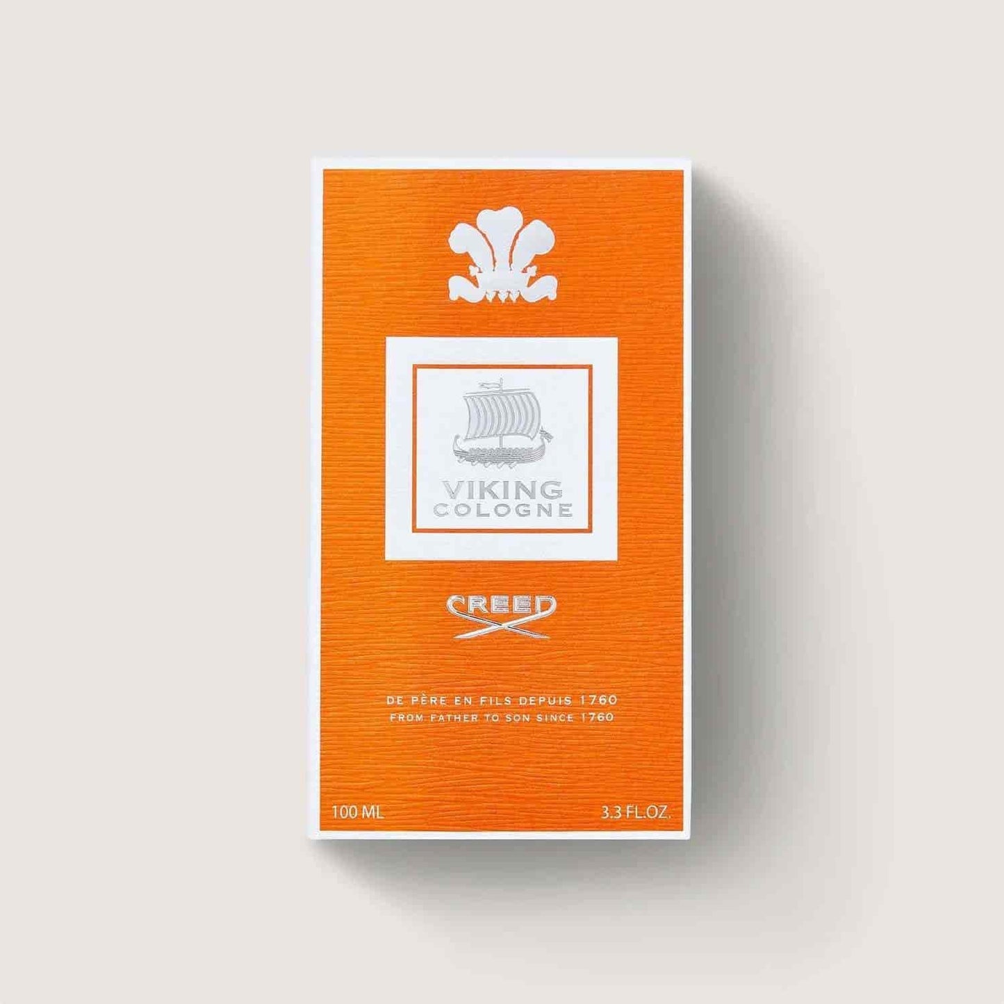 Orange box of Viking Cologne with white branding on a light gray background