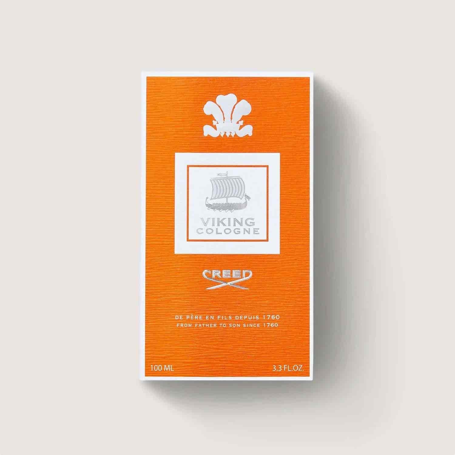 Orange box of Viking Cologne with white branding on a light gray background